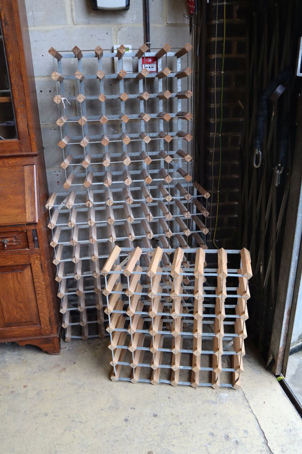 Three wine racks (total capacity 142 bottles)